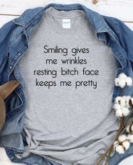 T-Shirt Smiling Gives Me Wrinkles Resting Bitch Face Keeps Me Pretty men women round neck tee. Printed and delivered from USA or UK